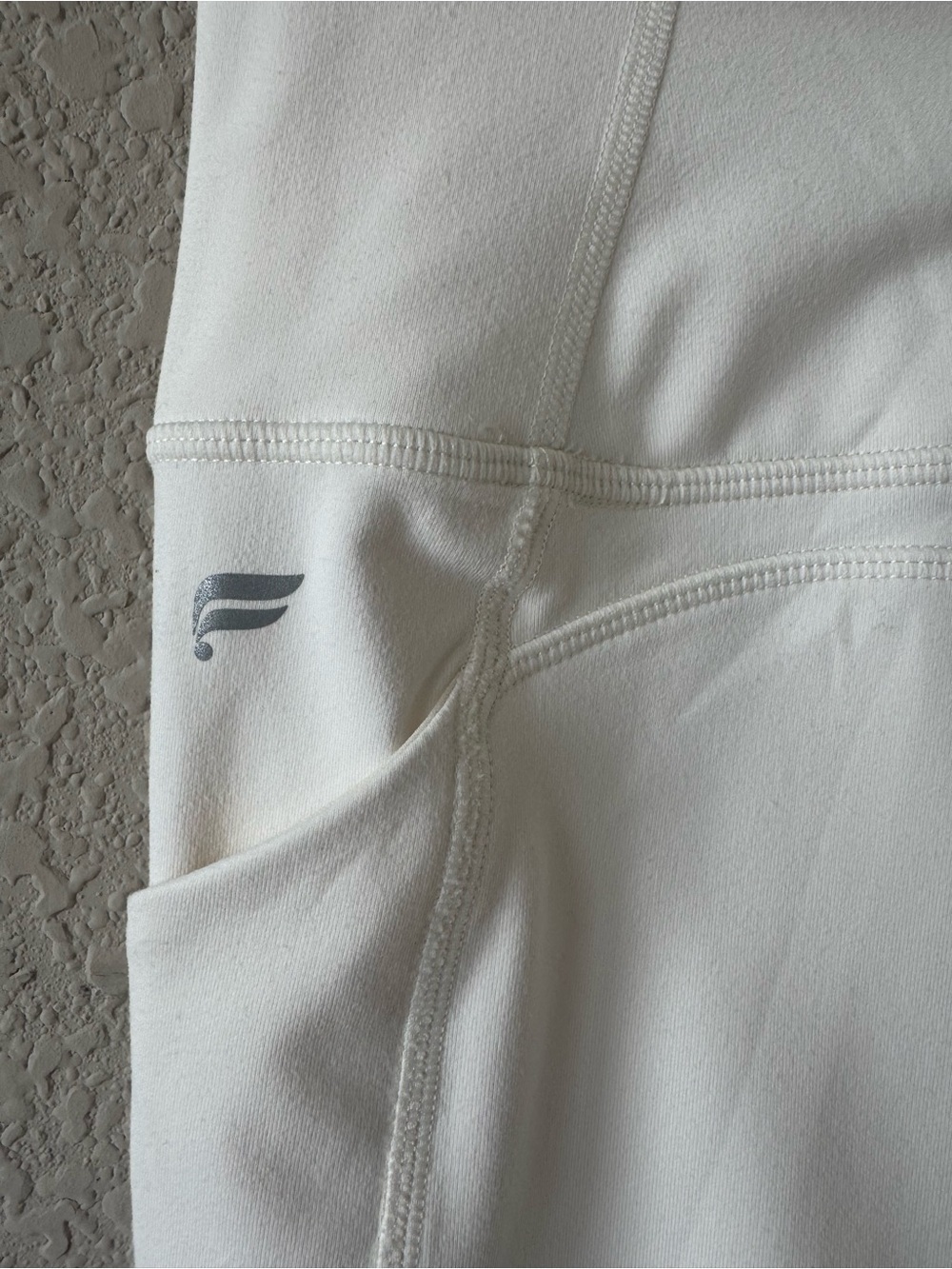 Fabletics Oasis PureLuxe High-Waisted 7/8 Legging Cream - Picture 5 of 9